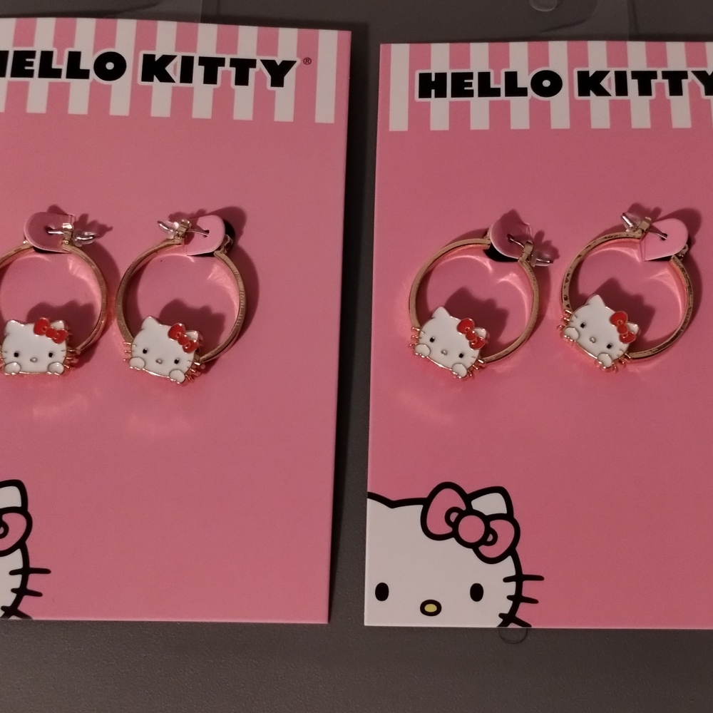 Sanrio Hello Kitty Gold-Tone Hoop Earrings with White Enamel Charms. 2 Sets